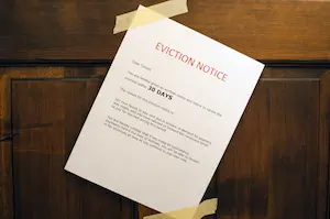 An eviction notice taped to a door