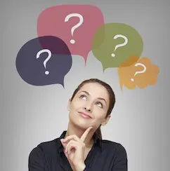 A woman look up with question mark bubbles around her head